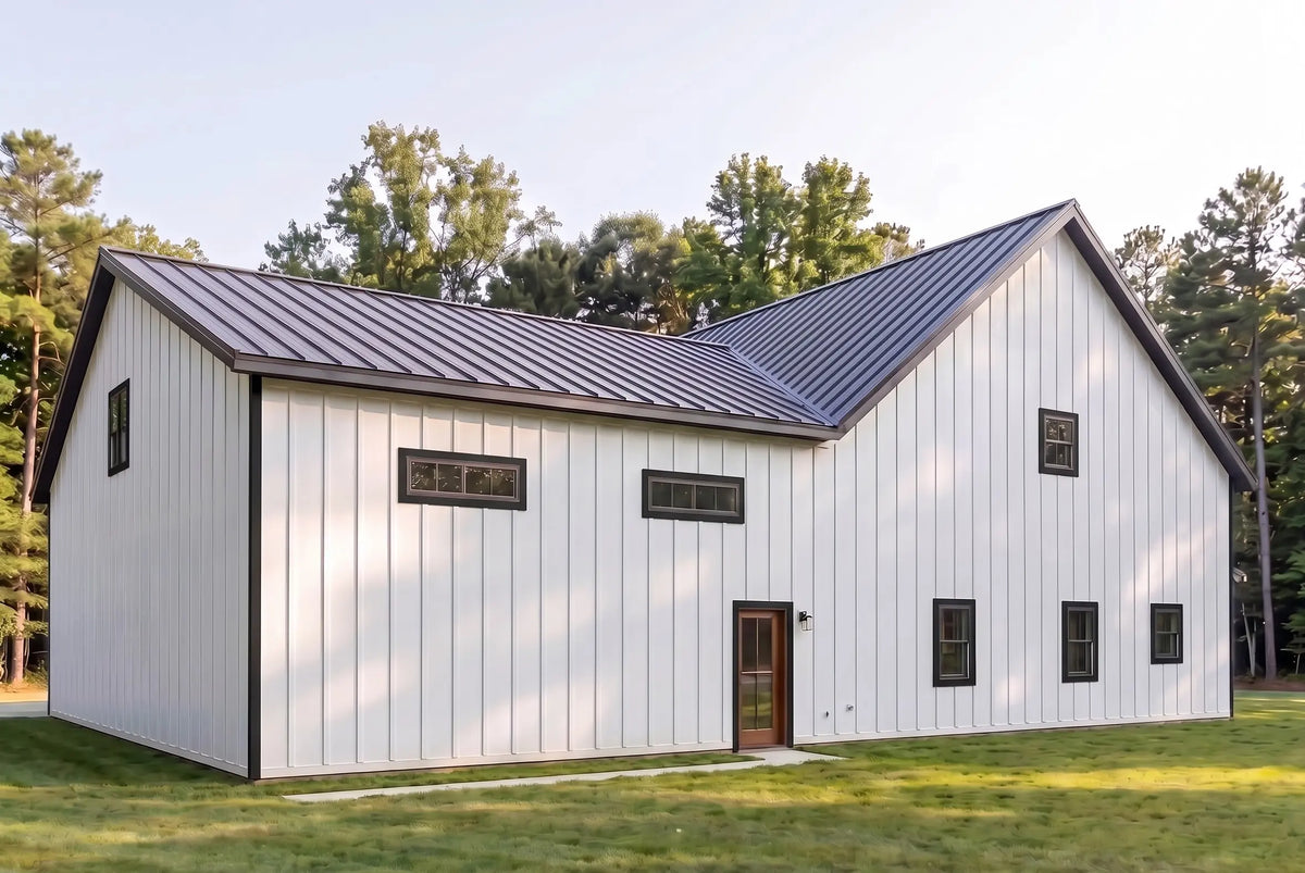 Modern farmhouse barndominium rear exterior with covered outdoor living space